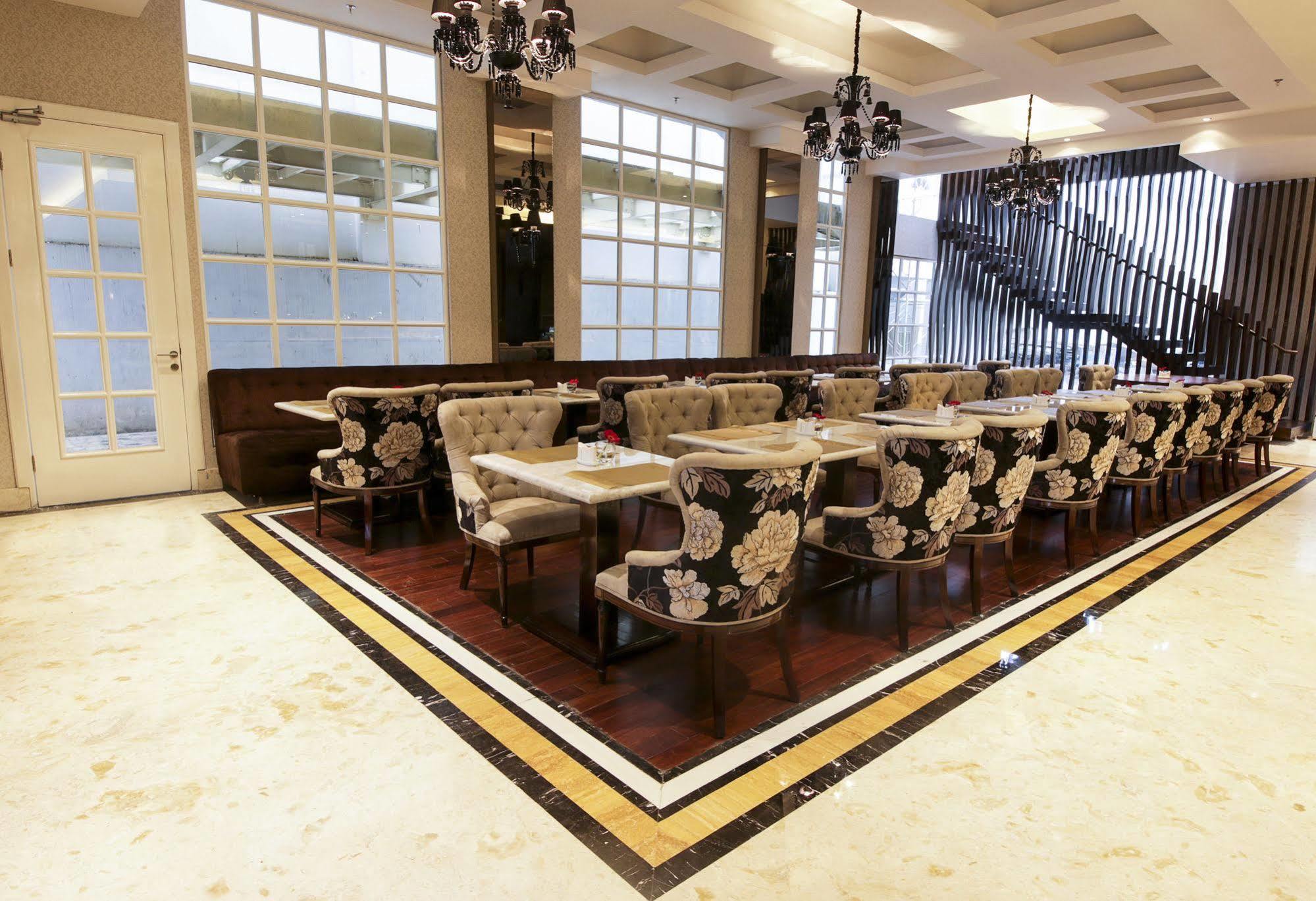 Cinnamon Hotel Boutique Syariah Tutugan Luaran gambar